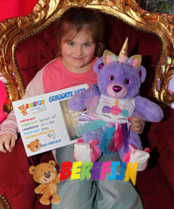 Teddy bear Glitz the purple teddy bear with her fantasy unicorn clothes
